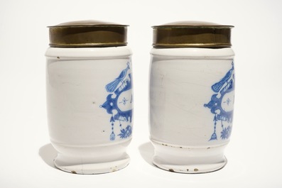 A pair of Dutch Delft blue and white albarello pharmacy jars with brass covers, 18th C.